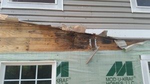 Picture of porch roof to wall flashing damage