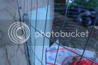 Picture of fence attached to basement wall