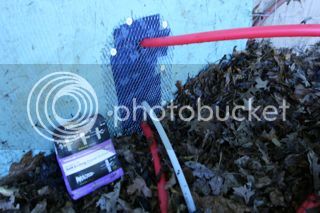 Picture of rodent proofing for tubing into house.