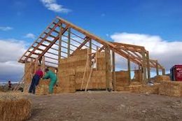 Picture of a strawbale building under construction